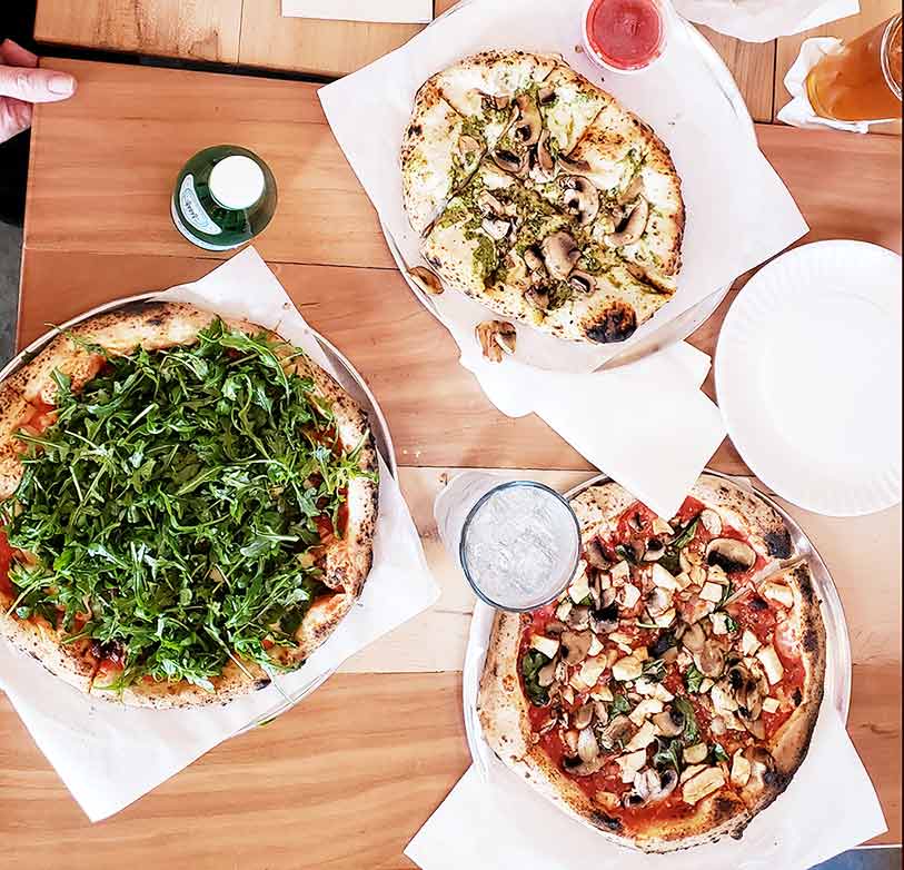 Pizza Party! A garlic flat bread, Tomasso and Pizza with Arugula