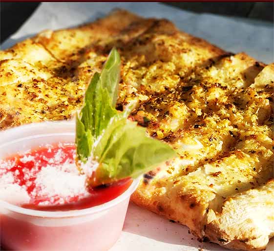 sun soaked garlic flat bread with marinara dip